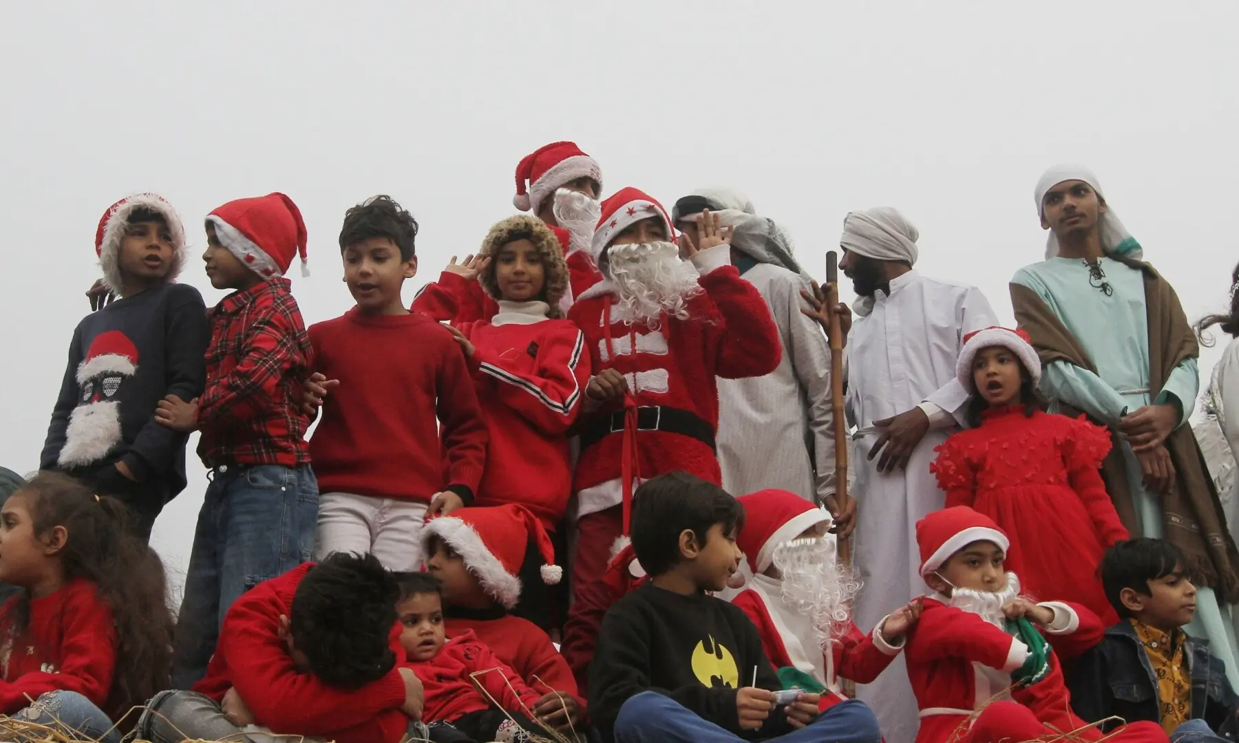 People take part in a Christmas rally at center point near Liberty Market, Lahore. &mdash;  Murtaza Ali/ White Star