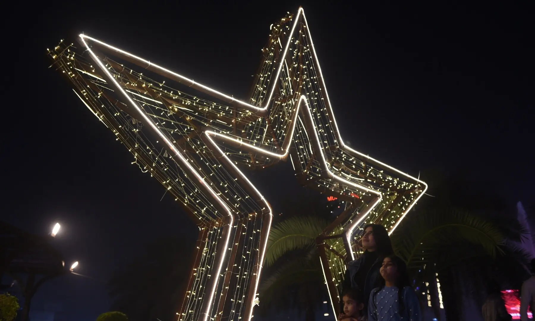 Illuminated view of Lahore&rsquo;s Liberty Ground, decorated for Christmas Eve celebrations. &mdash;  Murtaza Ali/ White Star