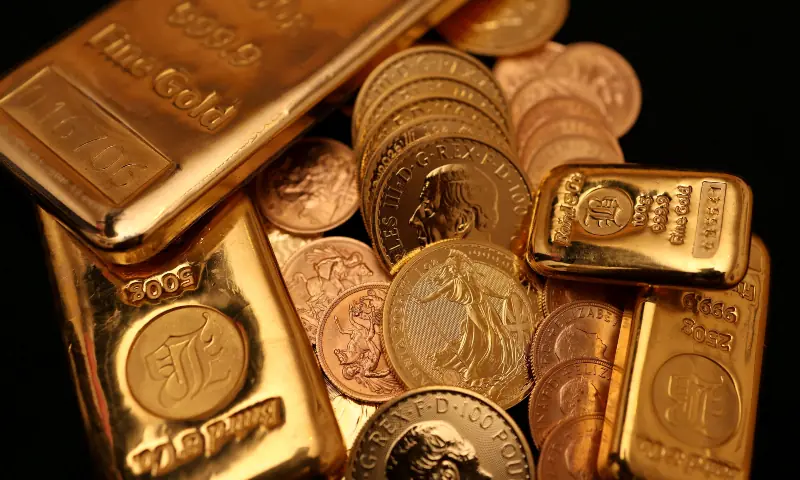 UK gold bars and gold Sovereign coins are displayed at Baird & Co in Hatton Garden in London, Britain on October 8, 2025. — Reuters/File UK gold bars and gold Sovereign coins are displayed at Baird & Co in Hatton Garden in London, Britain on October 8, 2025. — Reuters/File