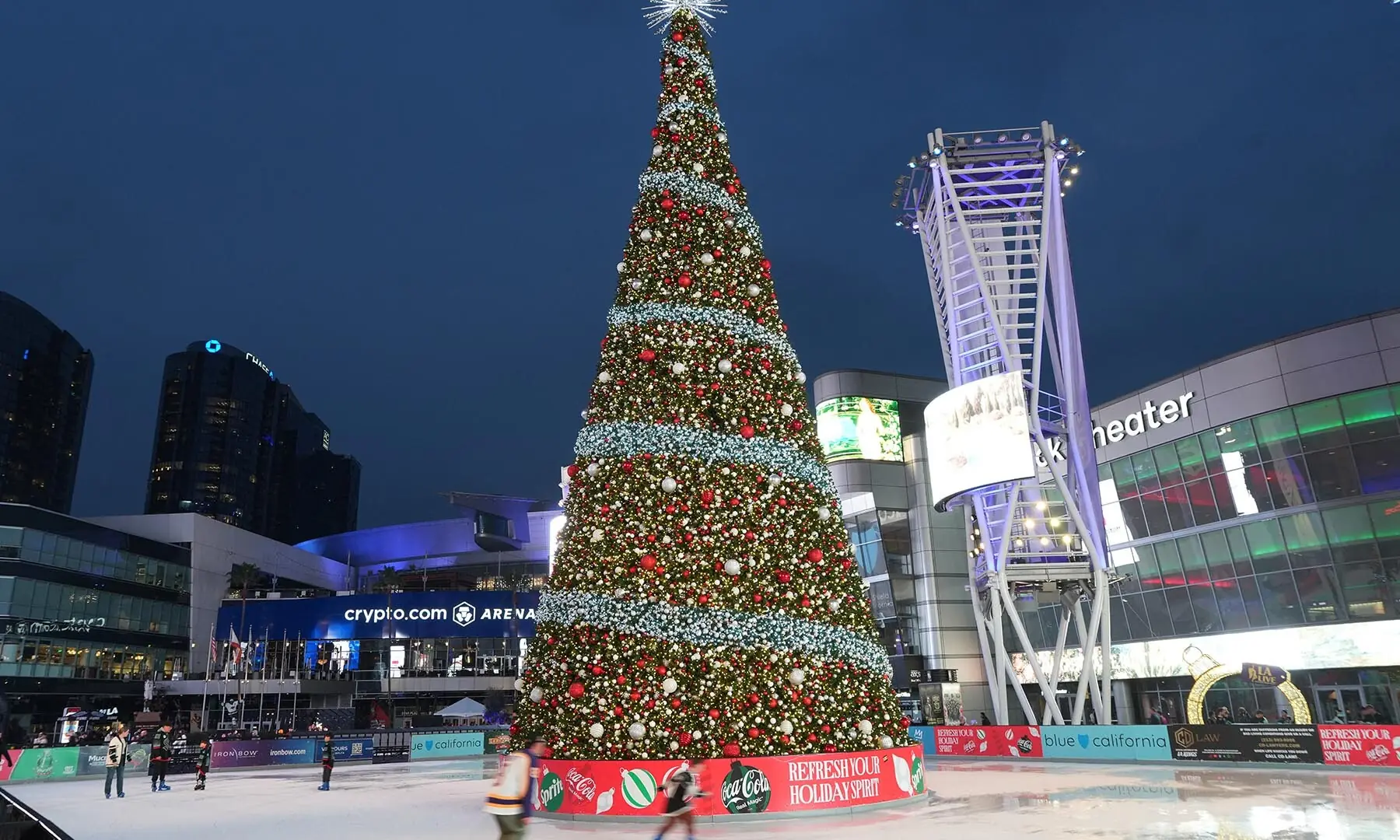 An ice skating rink and Christmas tree are set up at the LA Live Plaza at the Crypto.com Arena in Los Angeles, California, the US on December 23. &mdash; Reuters