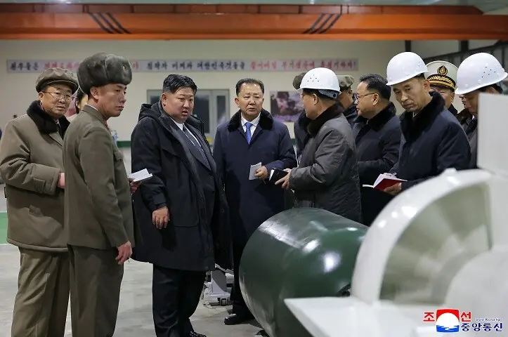 This picture released by North Korea&rsquo;s official Korean Central News Agency (KCNA) via KNS on December 25 shows North Korean leader Kim Jong Un visits the manufacturing site of an 8,700-tonnage nuclear-powered strategic guided missile submarine at an undisclosed location in North Korea. &mdash;AFP