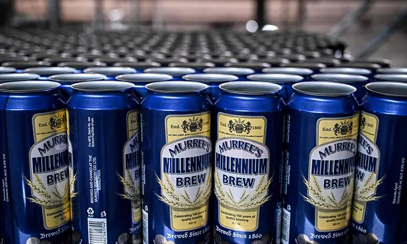 This photograph taken on December 17 shows beer cans on a production line at Murree Brewery in Rawalpindi. &mdash; AFP