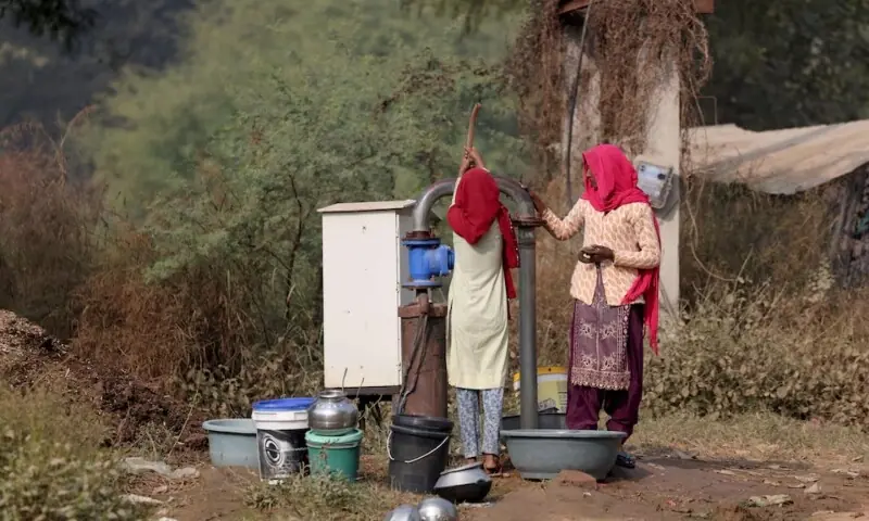 Women use a pipe to fill water from a borewell in a village in Alwar, Rajasthan, India on November 20. —Reuters Women use a pipe to fill water from a borewell in a village in Alwar, Rajasthan, India on November 20. —Reuters