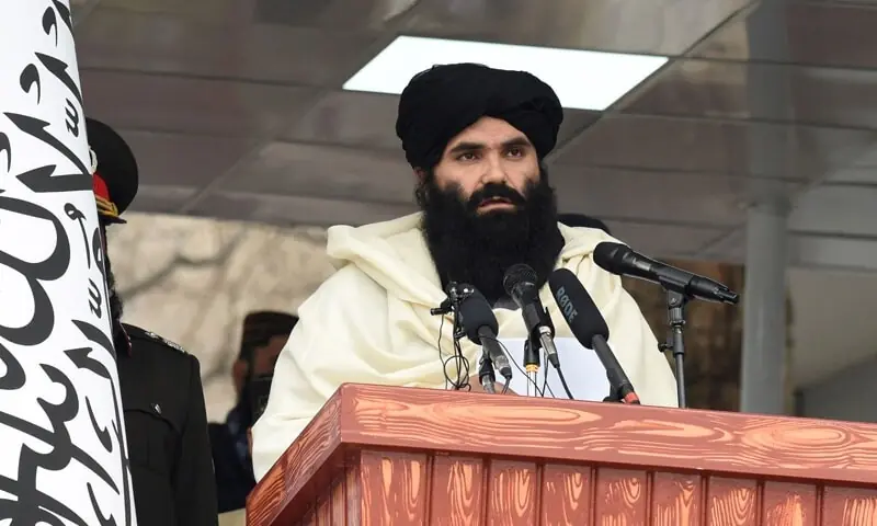 Acting Afghan Interior Minister Sirajuddin Haqqani speaks to new Afghan police recruits during a graduation ceremony at the police academy in Kabul. &mdash; AFP/FIle