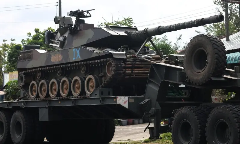 A military truck carries a tank on a road amid deadly clashes between Thailand and Cambodia along a disputed border area, in Surin province, Thailand, on December 11. — Reuters A military truck carries a tank on a road amid deadly clashes between Thailand and Cambodia along a disputed border area, in Surin province, Thailand, on December 11. — Reuters