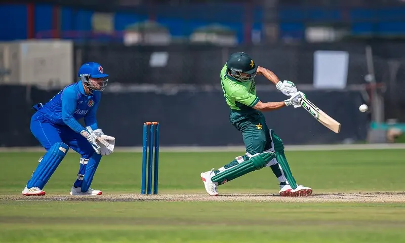 HARARE: Pakistan captain Farhan Yousaf plays a shot as Afghanistan skipper Mahboob Khan looks on during the ODI tri-series match at the Harare Sports Club on December 27, 2025.—Courtesy Zimbabwe Cricket HARARE: Pakistan captain Farhan Yousaf plays a shot as Afghanistan skipper Mahboob Khan looks on during the ODI tri-series match at the Harare Sports Club on December 27, 2025.—Courtesy Zimbabwe Cricket