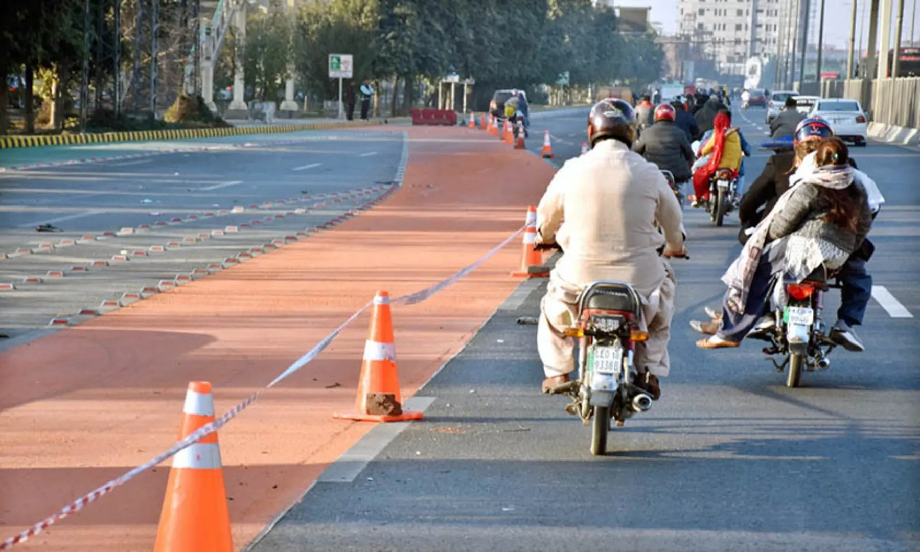Motorcyclists are seen on Lahore&rsquo;s Ferozepur, where the Lahore Development Authority (LDA) has created a separate lane for two-wheelers. &mdash; Associated Press of Pakistan