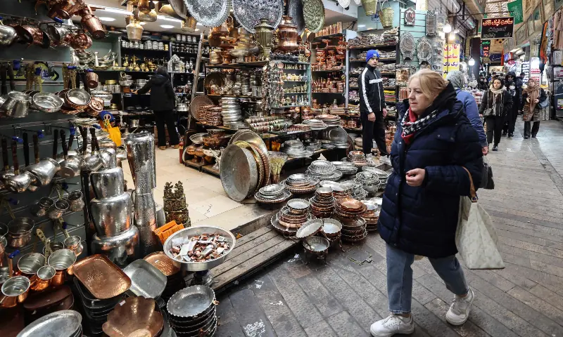 People shop at Tajrish Bazaar in the Iranian capital Tehran on December 29, 2025. &mdash; AFP