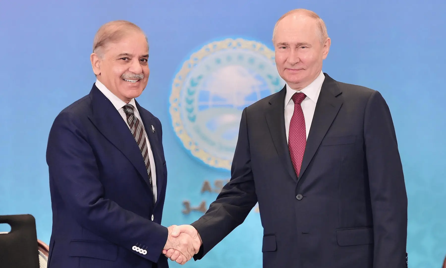 Prime Minister Shehbaz Sharif shakes hand with Russian President Vladimir Putin on the sidelines of a Shanghai Cooperation Organisation summit in Astana, Kazakhstan on July 3, 2024. &mdash; PID/File