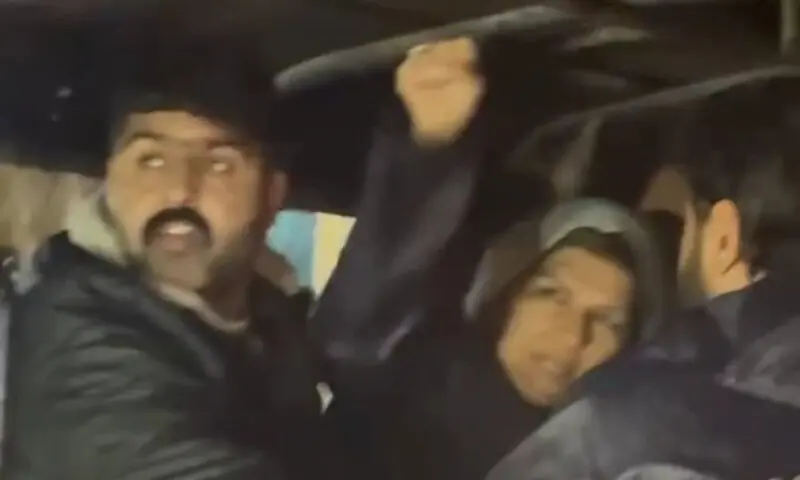 This image shared by the PTI shows Imran Khan’s sister Aleema Khan raising her fist in the air as she is driven away in a police van. — Photo courtesy @PTIofficial/X This image shared by the PTI shows Imran Khan’s sister Aleema Khan raising her fist in the air as she is driven away in a police van. — Photo courtesy @PTIofficial/X