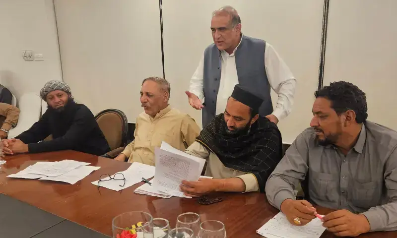 An agreement is signed between the federal government, the AJK government and the Joint Awami Action Committee in Muzaffarabad on Oct 4, 2025. — X/DrTariqFazal/file An agreement is signed between the federal government, the AJK government and the Joint Awami Action Committee in Muzaffarabad on Oct 4, 2025. — X/DrTariqFazal/file