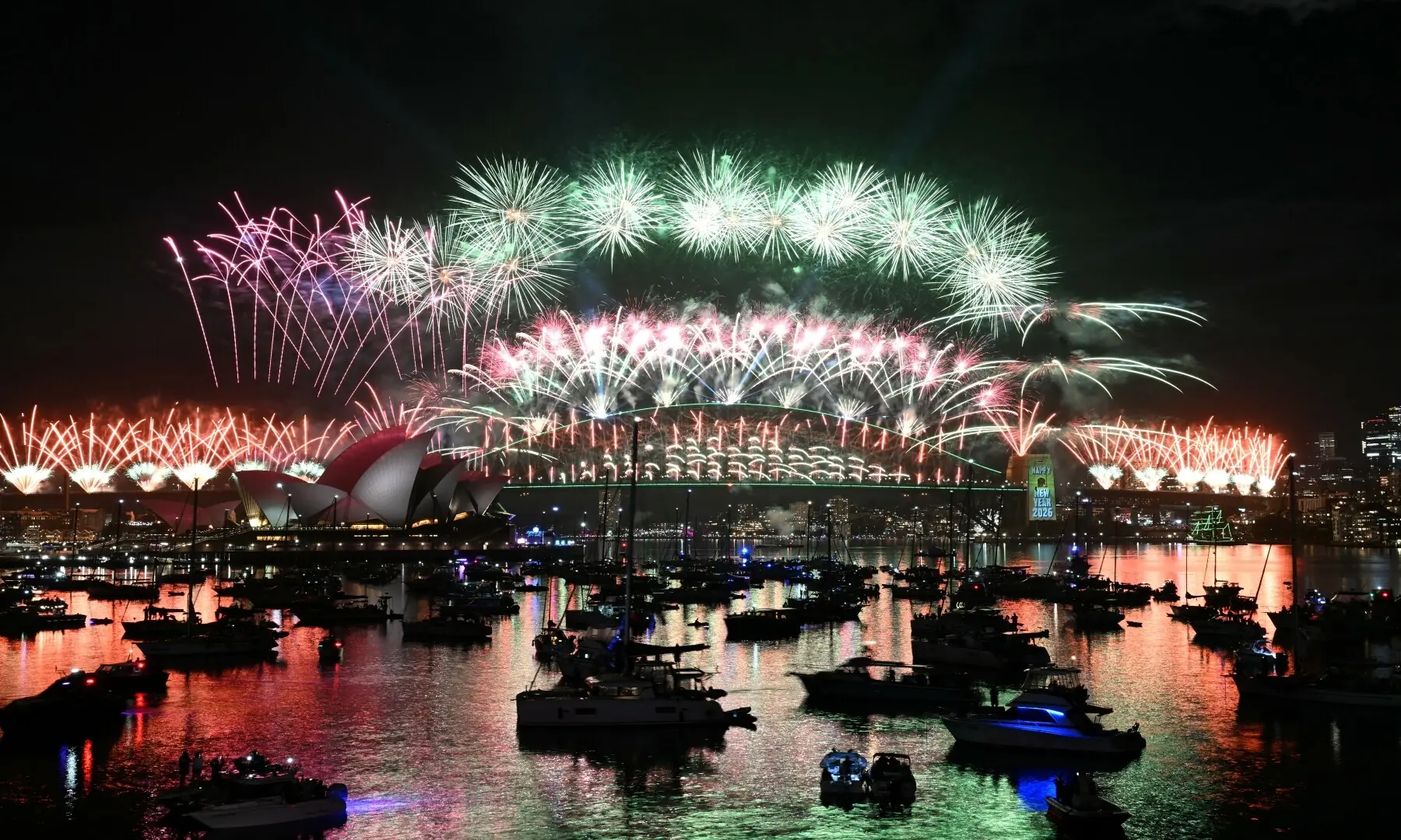 Fireworks light up the midnight sky over Sydney Harbour Bridge and Sydney Opera House during New Year&rsquo;s Day celebrations in Sydney on January 1, 2026. &mdash; Saeed Khan / AFP