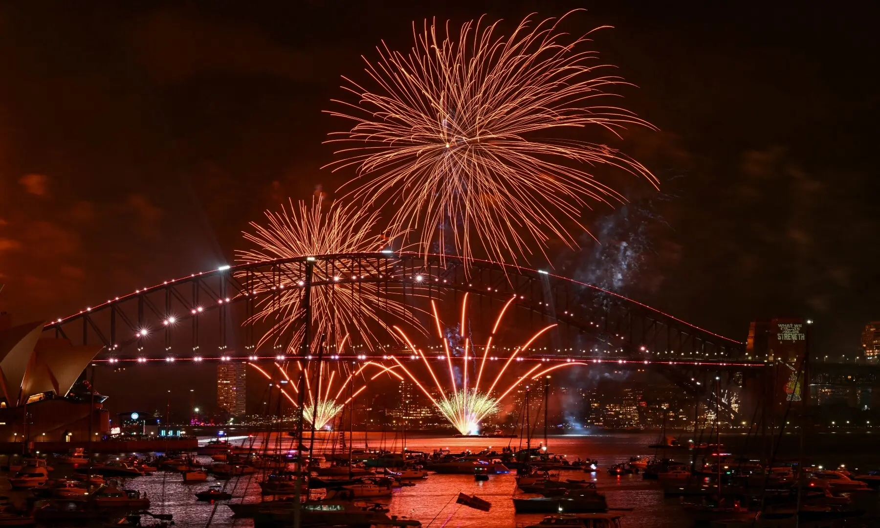 Fireworks light up the midnight sky over Sydney Harbour Bridge and Sydney Opera House during New Year&rsquo;s Day celebrations in Sydney on January 1, 2026. &mdash; Saeed Khan / AFP