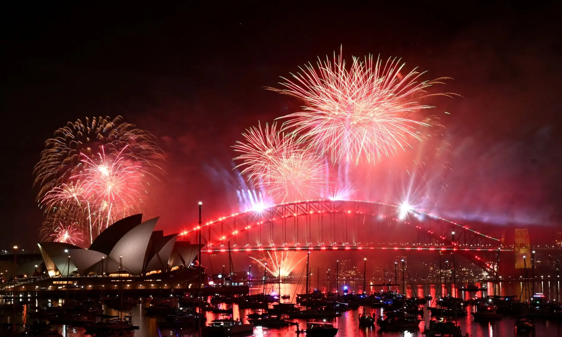 Fireworks light up the midnight sky over Sydney Harbour Bridge and Sydney Opera House during New Year&rsquo;s Day celebrations in Sydney on January 1, 2026. &mdash; Saeed Khan / AFP