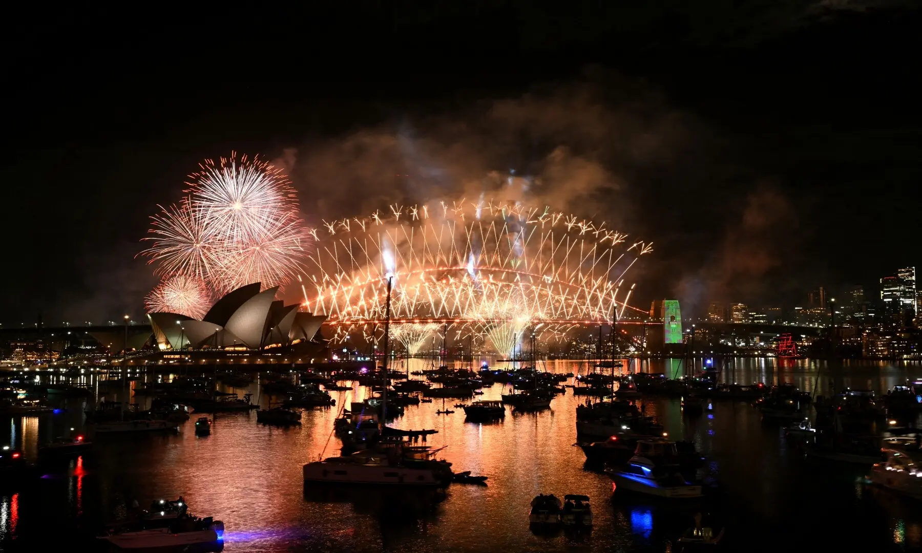 Fireworks light up the midnight sky over Sydney Harbour Bridge and Sydney Opera House during New Year&rsquo;s Day celebrations in Sydney on January 1, 2026. &mdash; Saeed Khan / AFP