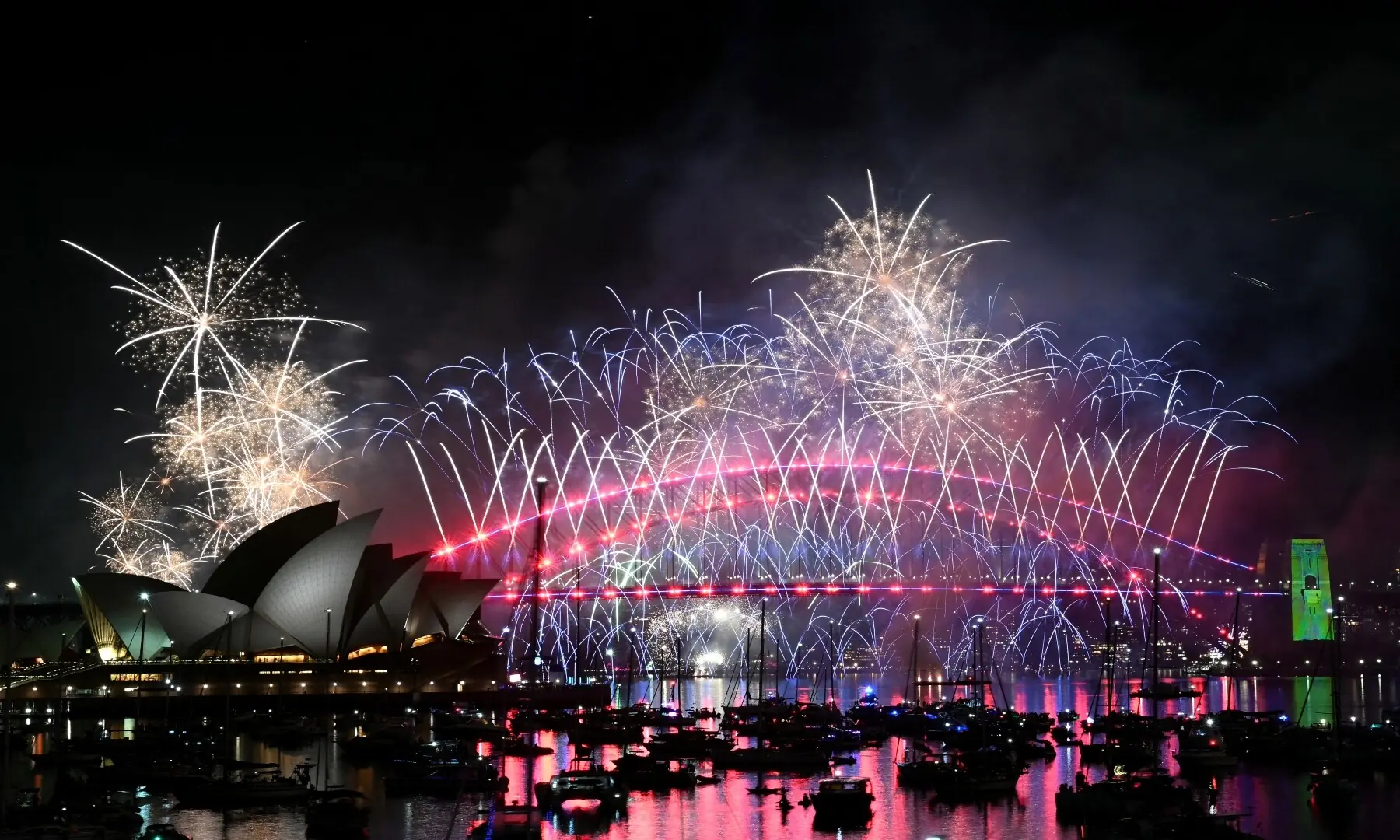 Fireworks light up the midnight sky over Sydney Harbour Bridge and Sydney Opera House during New Year&rsquo;s Day celebrations in Sydney on January 1, 2026. &mdash; Saeed Khan / AFP