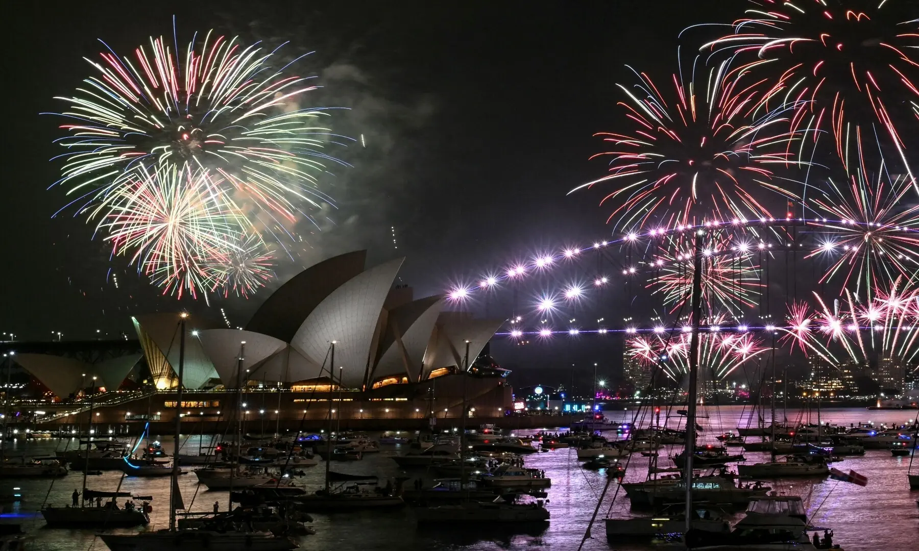 Fireworks light up the midnight sky over Sydney Harbour Bridge and Sydney Opera House during New Year&rsquo;s Day celebrations in Sydney on January 1, 2026. &mdash; Saeed Khan / AFP