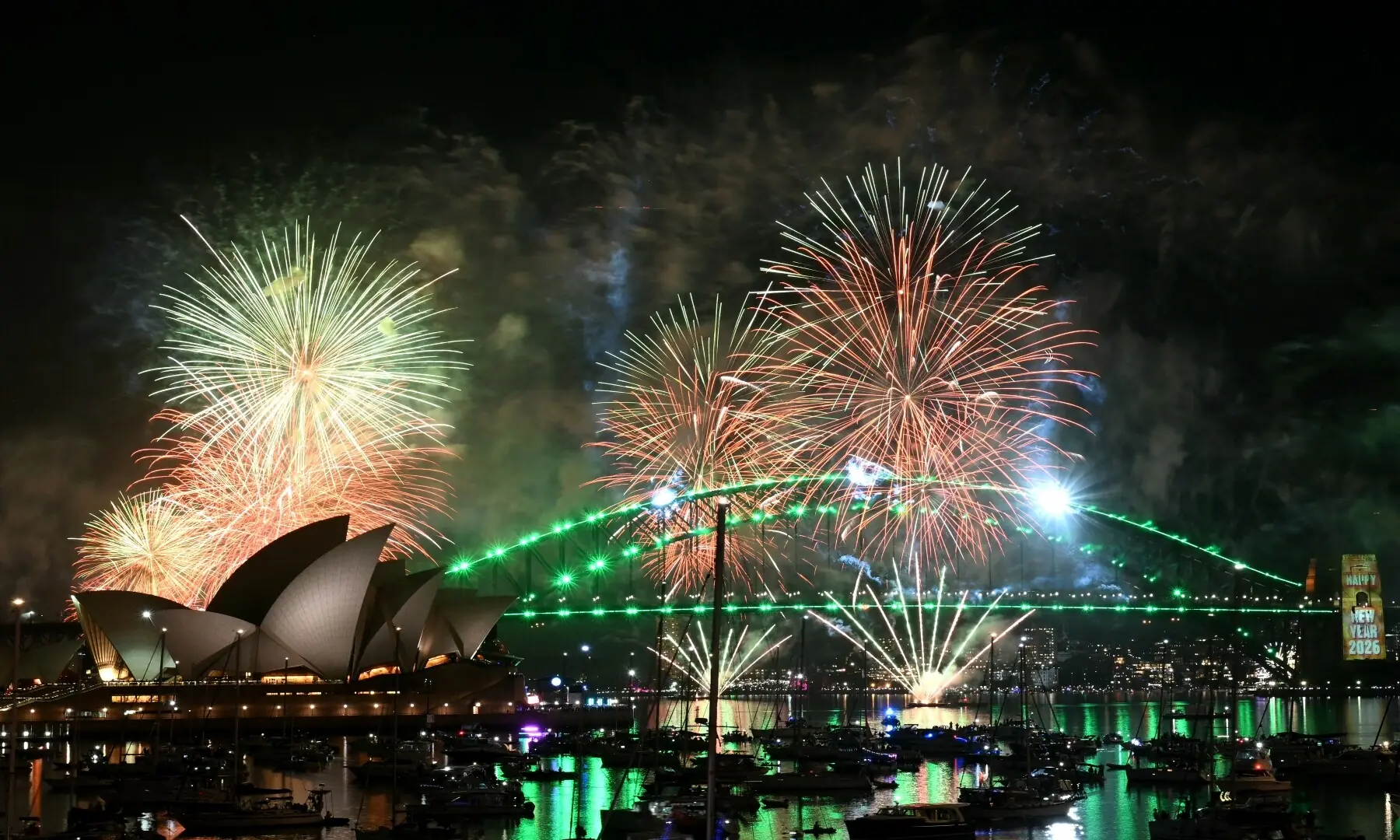 Fireworks light up the midnight sky over Sydney Harbour Bridge and Sydney Opera House during New Year&rsquo;s Day celebrations in Sydney on January 1, 2026. &mdash; Saeed Khan / AFP