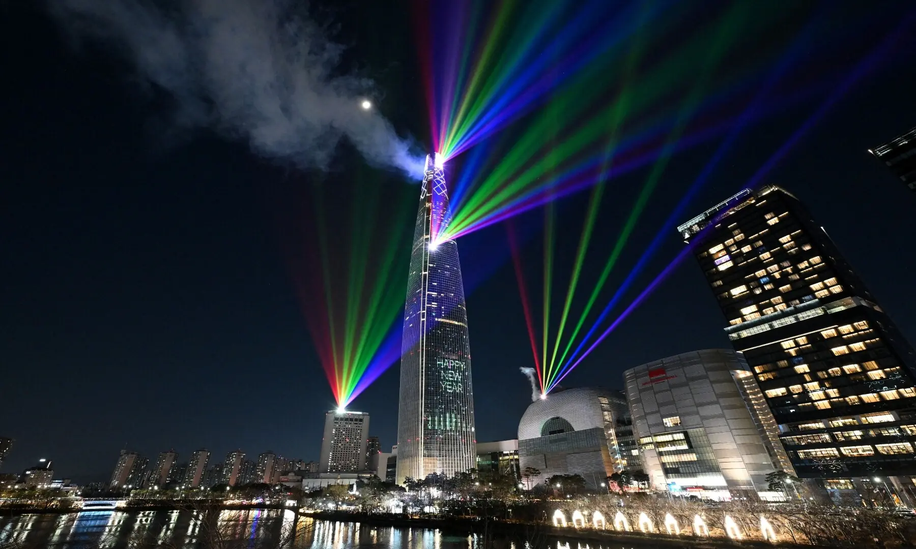 Laser lights illuminate the midnight sky over the Lotte World Tower, South Korea&rsquo;s tallest building in Seoul during New Year&rsquo;s Day celebrations on January 1, 2026. &mdash; Jung Yeon-je / AFP