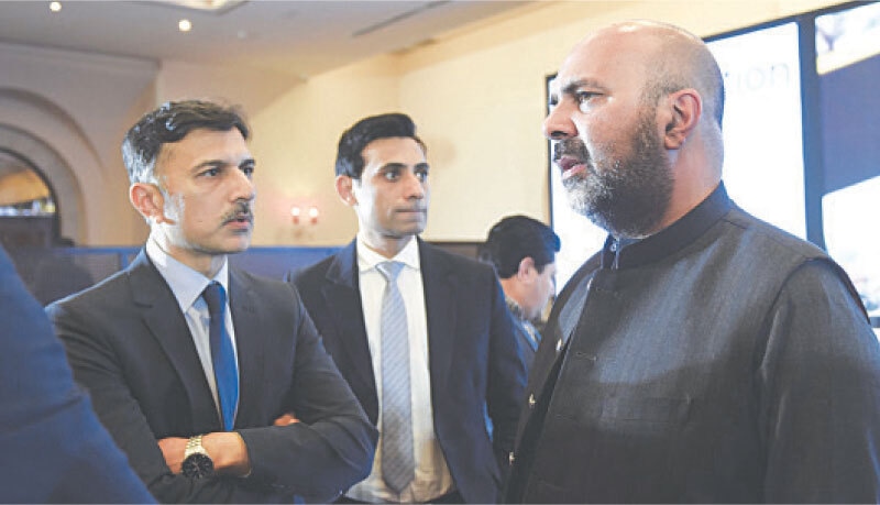 FORMER KP health minister Taimur Saleem Jhagra speaks to an audience member following his session. &mdash; White Star