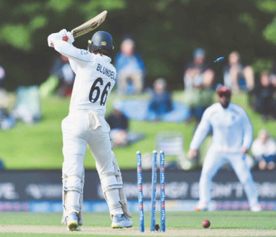 CHRISTCHURCH: New Zealand batter Tom Blundell is cleaned up by West Indies pacer Ojay Shields during the first Test at the Hagley Oval on Tuesday.—AFP
