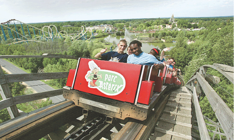 THIS July 21, 2004, picture shows people on the rollercoaster at Parc Ast&eacute;rix amusement park in Plailly, France.&mdash;AFP