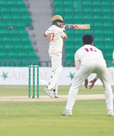 Sialkot opener Mohammad Hurraira in action during the Quaid-e-Azam Trophy final against Karachi Blues at the Gaddafi Stadium on Thursday.—Courtesy PCB