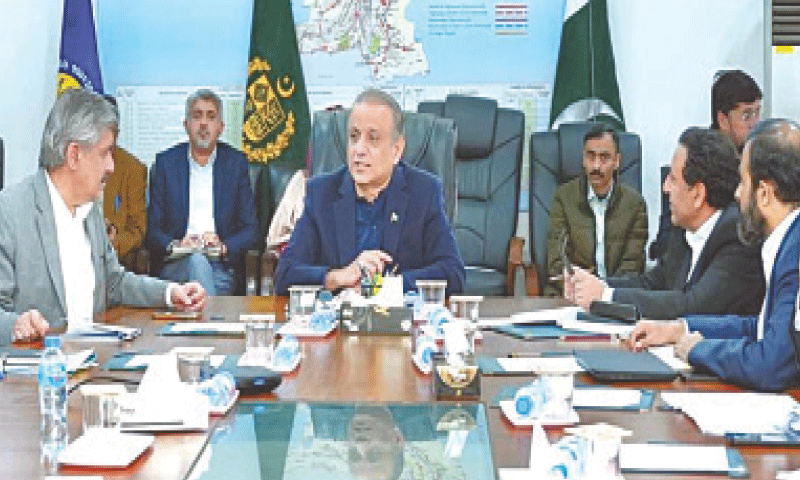 Communications Minister Abdul Aleem Khan receives a briefing on various National Highway Authority projects.—PPI
