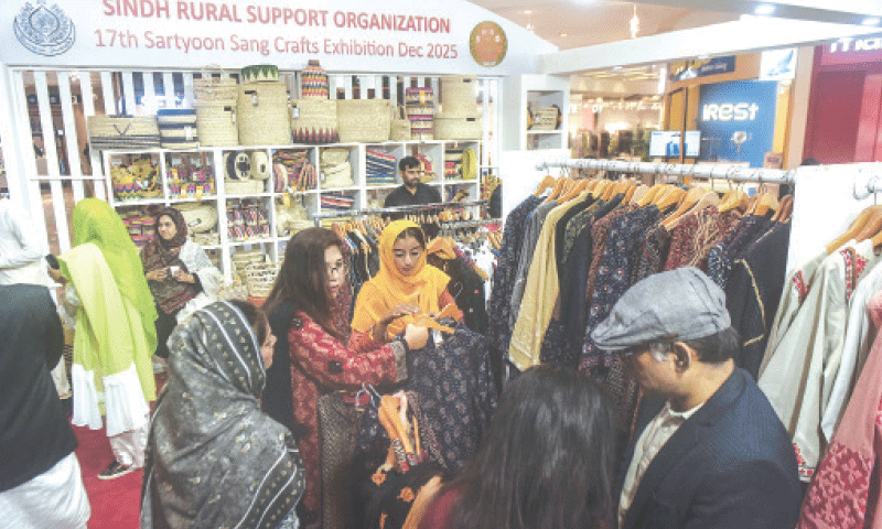 People select items to purchase at the exhibition. &mdash;Fahim Siddiqi / White Star