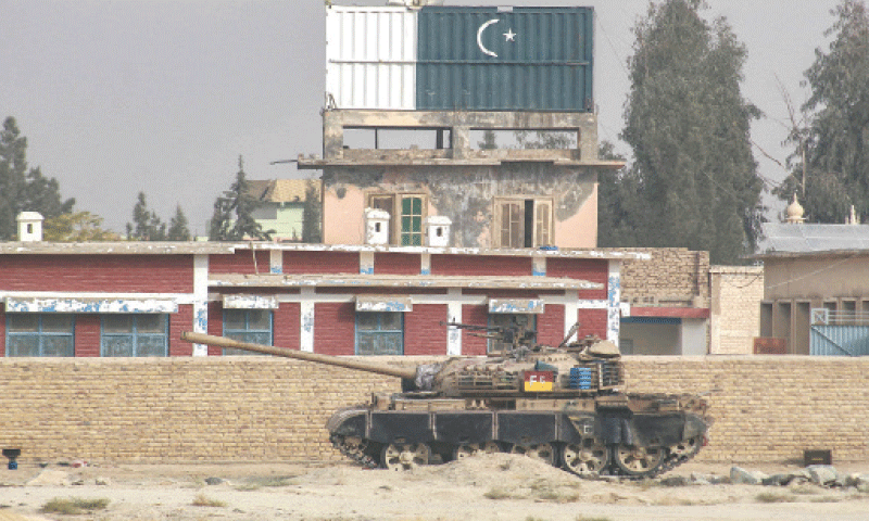 AN armoured vehicle stands at the Pak-Afghan border in Chaman on Saturday, following overnight clashes between the two countries.—AFP AN armoured vehicle stands at the Pak-Afghan border in Chaman on Saturday, following overnight clashes between the two countries.—AFP