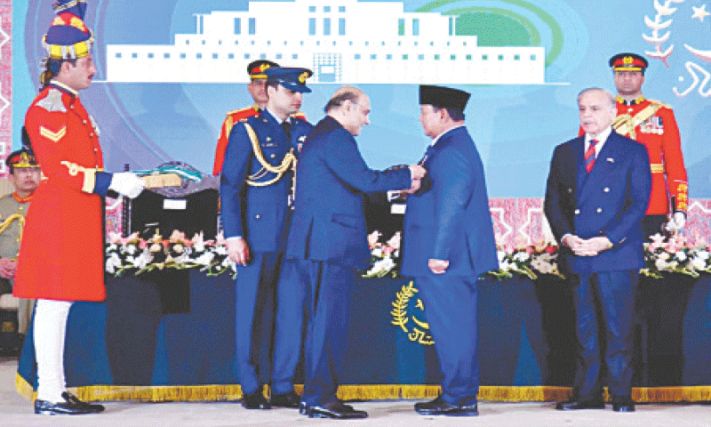 President Asif Ali Zardari confers the Nishan-i-Pakistan on his Indonesian counterpart Prabowo Subianto.&mdash;APP