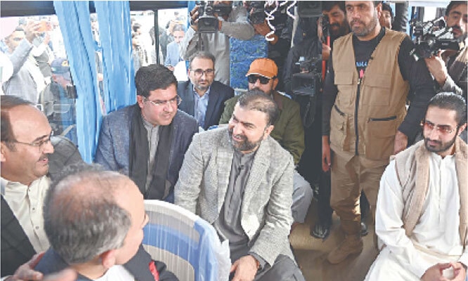  BALOCHISTAN Chief Minister Mir Sarfraz Bugti travels in one of the newly inaugurated Pink buses in Quetta.&mdash;PPI 