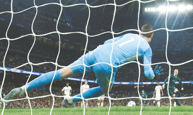 MADRID: Manchester City&rsquo;s Erling Haaland scores from a penalty during the Champions League match against Real Madrid at Estadio Santiago Bernabeu.&mdash;Reuters