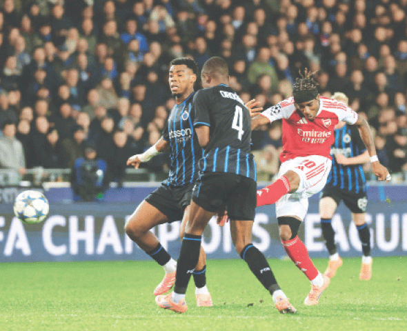 BRUGES: Arsenal&rsquo;s Noni Madueke scores during the Champions League match against Club Brugge at the Jan Breydel Stadium.&mdash;Reuters