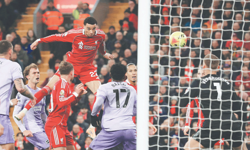 LIVERPOOL: Liverpool&rsquo;s Hugo Ekitike (top) scores past Brighton & Hove Albion goalkeeper Bart Verbruggen during their Premier League match at Anfield on Saturday.&mdash;Reuters