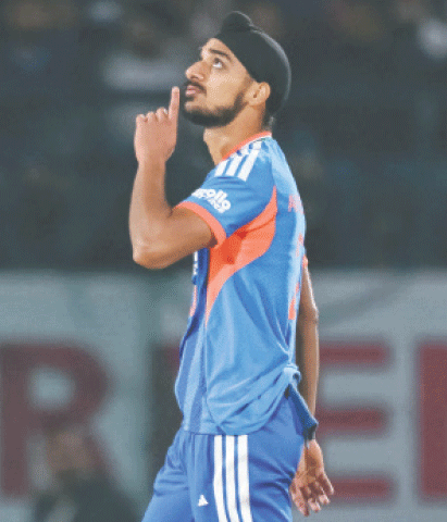INDIAN pacer Arshdeep Singh celebrates after dismissing South African captain Aiden Markram during the third T20 International on Sunday.&mdash;AFP