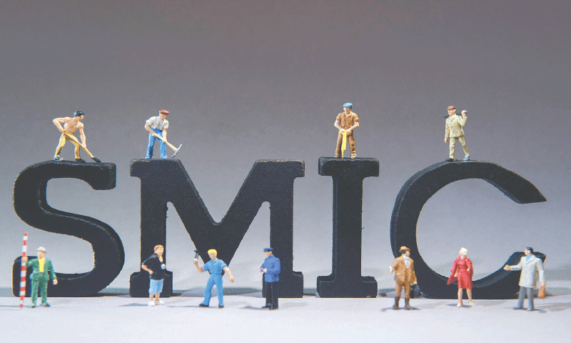 This picture taken last week in Lille shows figurines of workers set around the acronym SMIC “Salaire minimum de croissance - statutory minimum wage”. The French government will raise the minimum wage by 1.18pc on January 1, 2026, without granting any additional boost beyond its automatic increase, union sources said last week.—AFP This picture taken last week in Lille shows figurines of workers set around the acronym SMIC “Salaire minimum de croissance - statutory minimum wage”. The French government will raise the minimum wage by 1.18pc on January 1, 2026, without granting any additional boost beyond its automatic increase, union sources said last week.—AFP