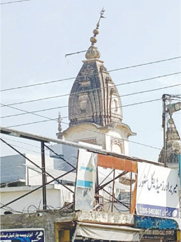 The Dhwaja Stambha (ceremonial flagstaff) of ancient Hindu temple in Taxila is near collapse. — Dawn