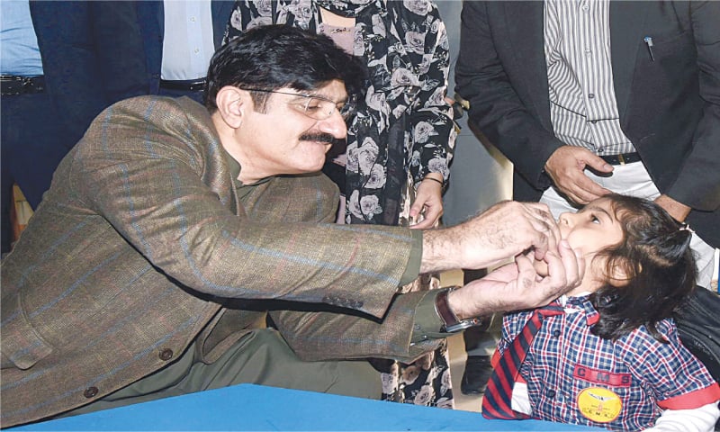 Chief Minister Murad Ali Shah administers polio drops to a child.&mdash;PPI