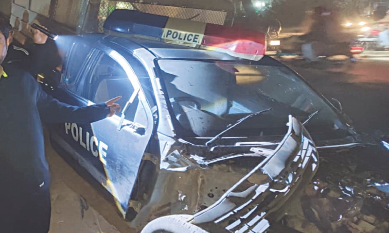 THE damaged police vehicle after the deadly collision with the Millat Express at an unmanned crossing in Sargodha.&mdash;Dawn