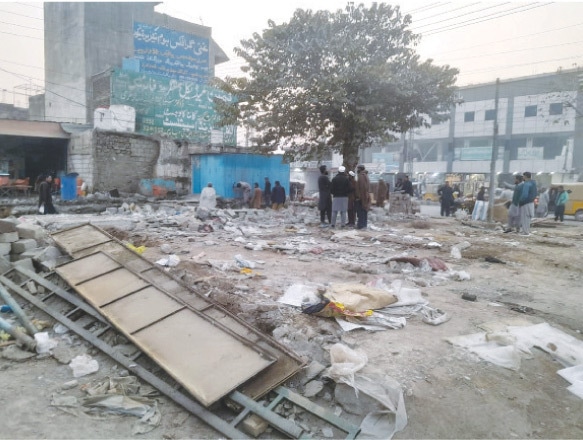 Pakistan Railways carries out an anti-encroachment operation near Usman Khattar Railway Station on the Taxila&ndash;Havelian section on Tuesday. &mdash; Online