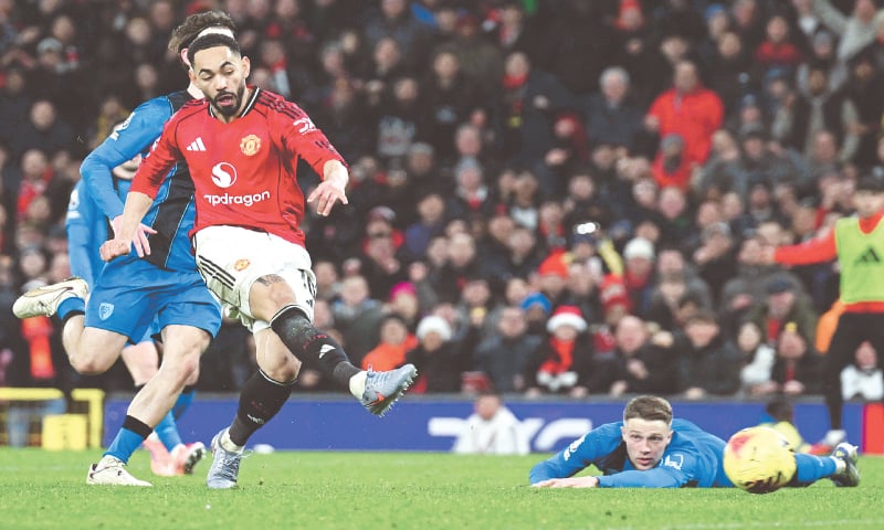 MANCHETSER United’s Matheus Cunha shoots to score against Bournemouth during their Premier League match at Old Trafford.—AFP MANCHETSER United’s Matheus Cunha shoots to score against Bournemouth during their Premier League match at Old Trafford.—AFP