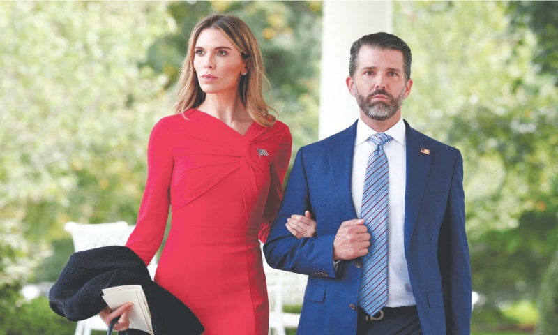 Donald Trump Jr. and Bettina Anderson attend a ceremony held by President Donald Trump to award posthumously the Medal of Freedom to Charlie Kirk in the Rose Garden at the White House on Oct 14.&mdash;Reuters