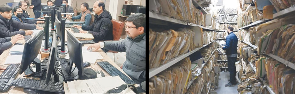 Staff of the Punjab Land and Revenue Authority work on computers as residential and commercial property records are digitised. In the other picture, an official walks between rows of various documents collected over the years. &mdash; Photos by Mohammad Asim