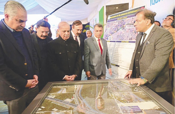 Prime Minister Shehbaz Sharif is briefed about the Allama Iqbal flyover at T-Chowk after its inauguration on Thursday. — White Star