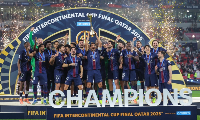 PSG players celebrate with the FIFA Intercontinental Cup trophy after defeating Flamengo in the final at the Ahmad bin Ali Stadium.—AFP PSG players celebrate with the FIFA Intercontinental Cup trophy after defeating Flamengo in the final at the Ahmad bin Ali Stadium.—AFP
