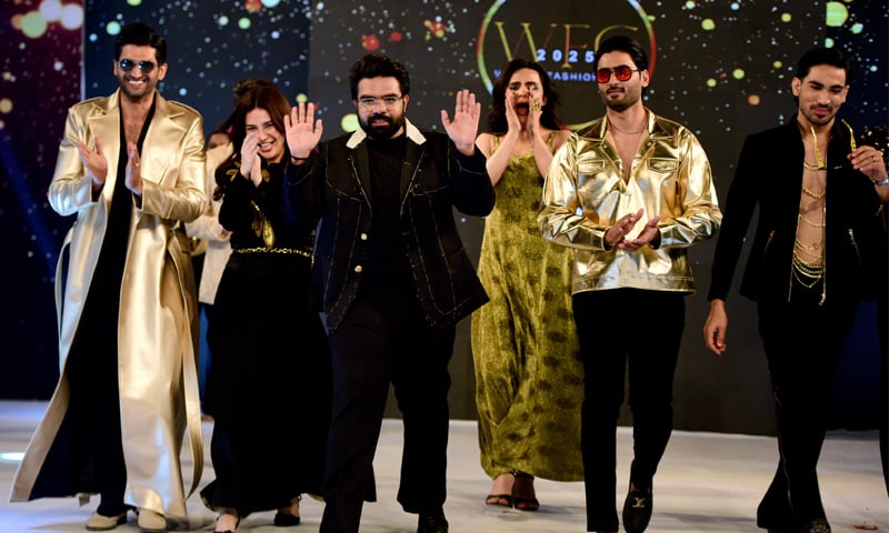 The designer with his models
