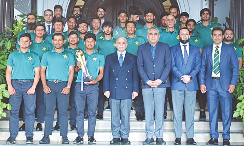 PAKISTAN Under-19 team players and support staff pose for a photo with Prime Minister Shehbaz Sharif, Pakistan Cricket Board chairman Mohsin Naqvi and other government officials on Monday.&mdash;White Star