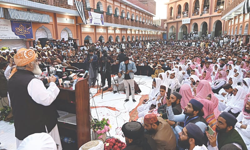JUI-F chief Maulana Fazlur Rehman addresses the conference in Larkana on Tuesday.&mdash;Saeed Memon
