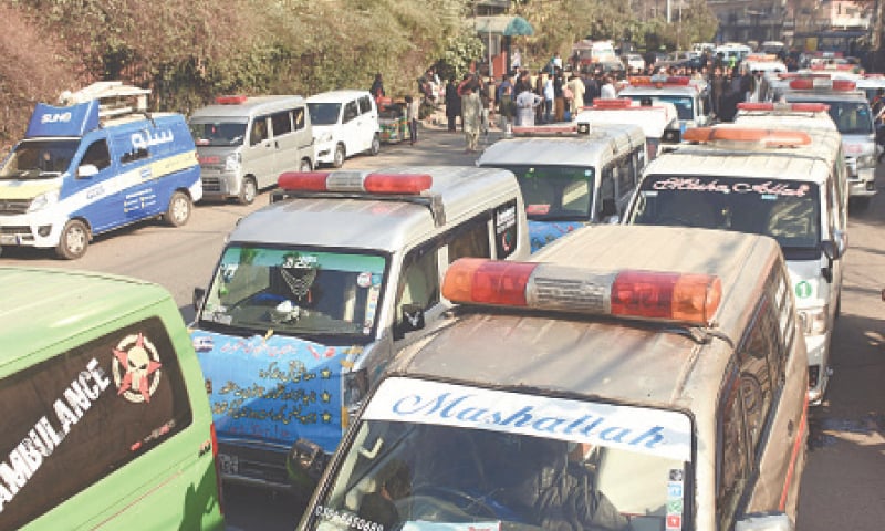 Private ambulances parked in front of the press club during a protest by their owners and drivers against new restrictions imposed by the Punjab government. — Online Private ambulances parked in front of the press club during a protest by their owners and drivers against new restrictions imposed by the Punjab government. — Online